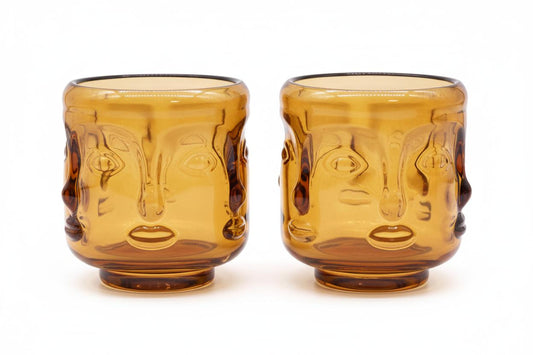 Pair of Buddha Faces Candle Holders - Antique Amber